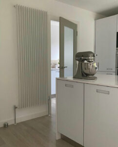 White Concord Slimline radiator in a kitchen
