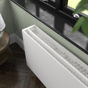 Top view of Stelrad's Planar K3 radiator against a green wall within a conservatory