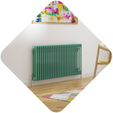 a green column radiator in a room with beige walls and a painting