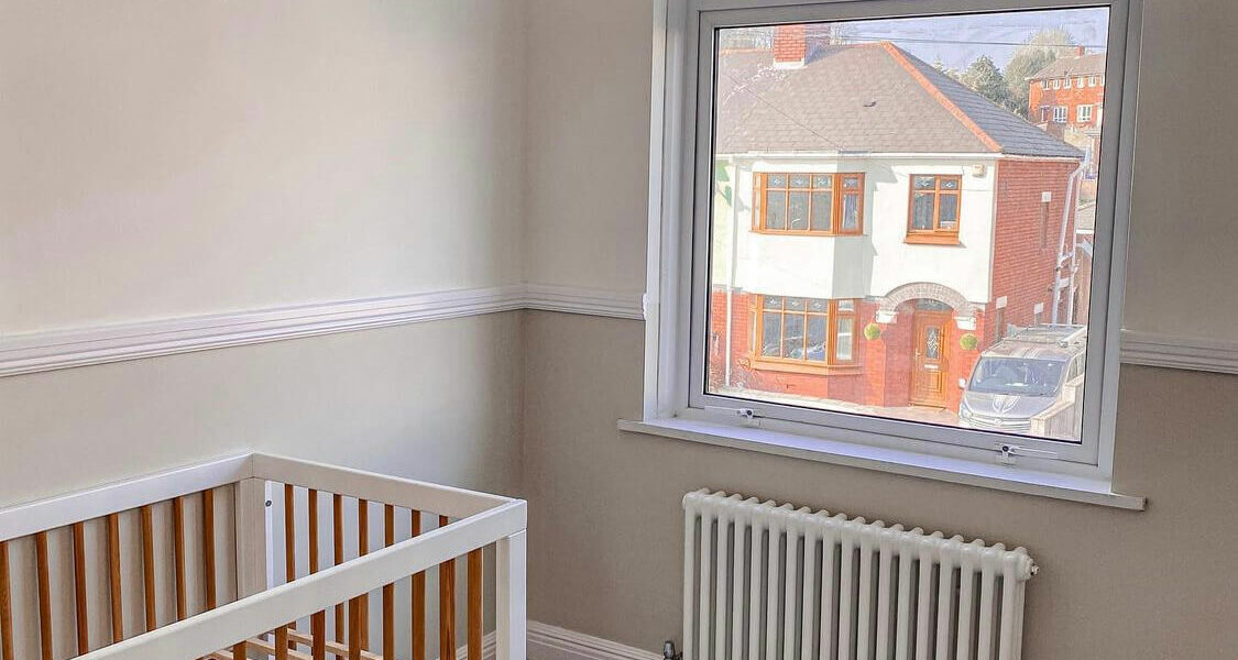 Column Radiator in Bedroom