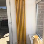 Column Vertical Coloured Yellow Radiator