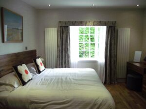 Concord Vertical Radiators in Bedroom