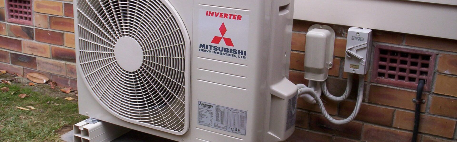 an air source heat pump outside a house