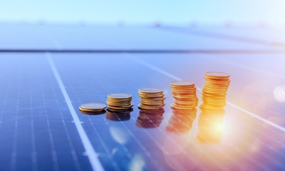 stacks of coins increasing in size on a solar panel