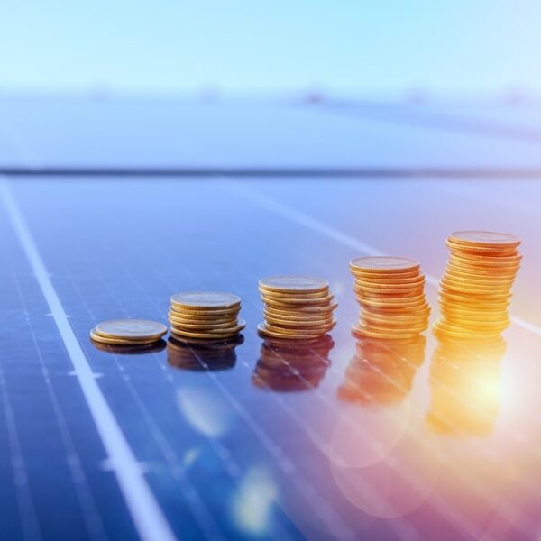 stacks of coins increasing in size on a solar panel