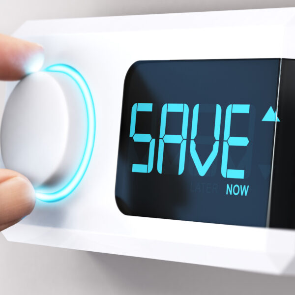 electric radiator thermostat with the word "save" displayed on it